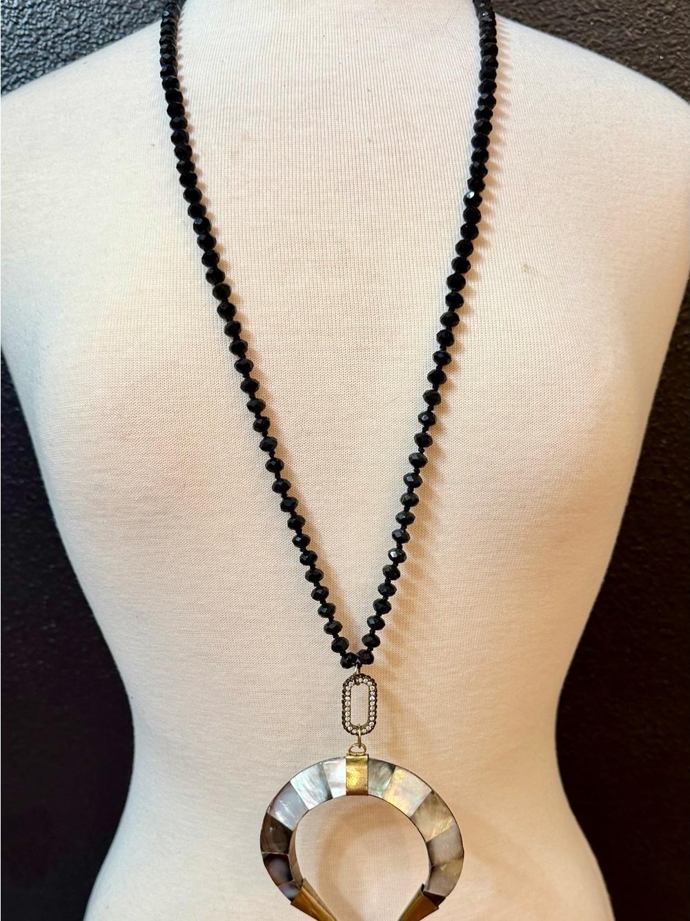 Black Beaded Necklace with Mother-of-Pearl Circle Pendant